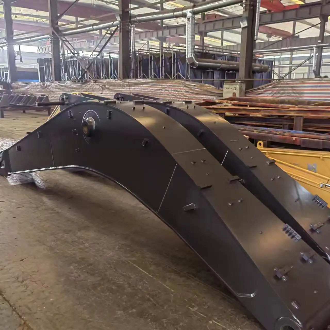 What material is standard size excavator boom and arm made of?